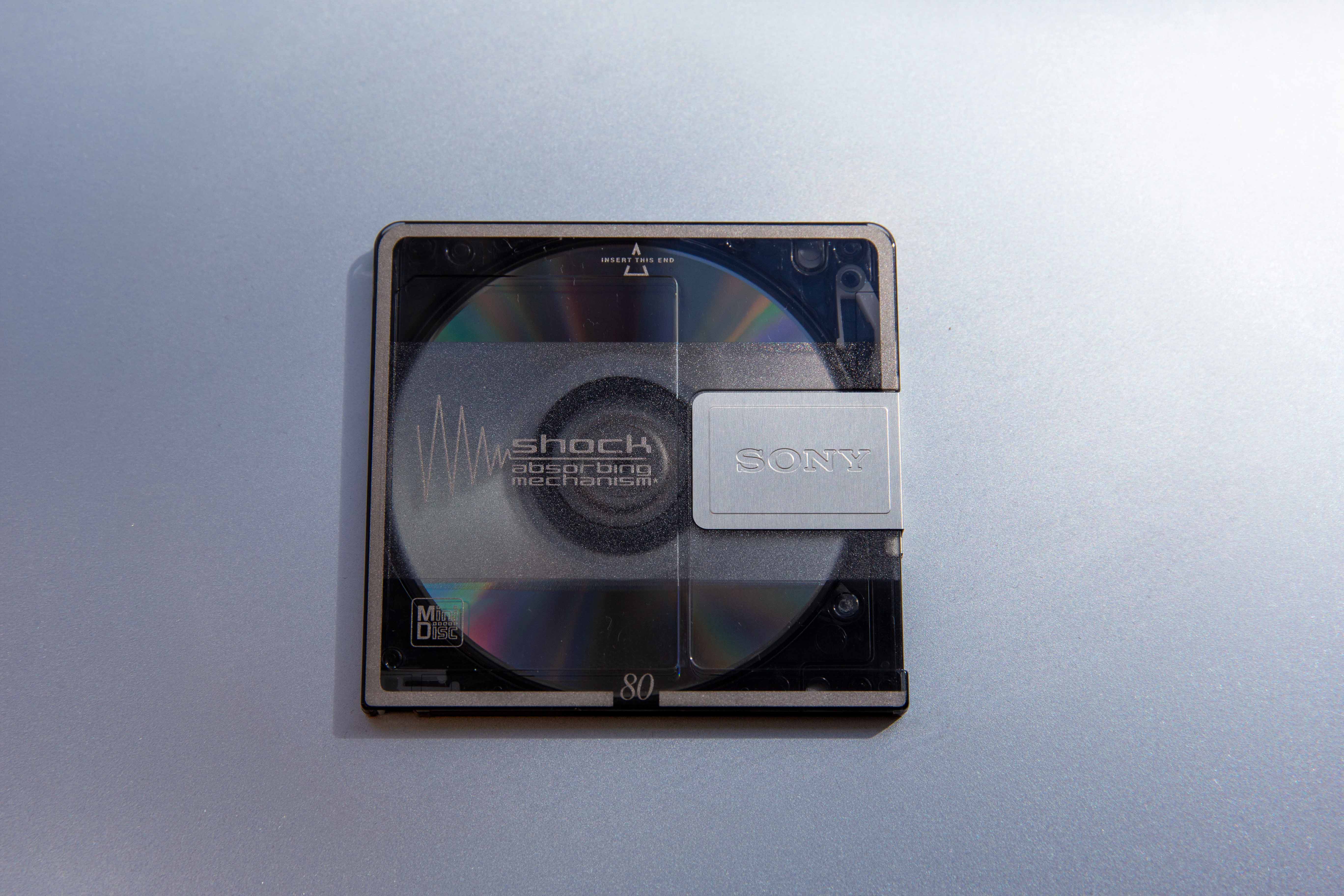 Front view of a Sony MiniDisc showing its protective cartridge