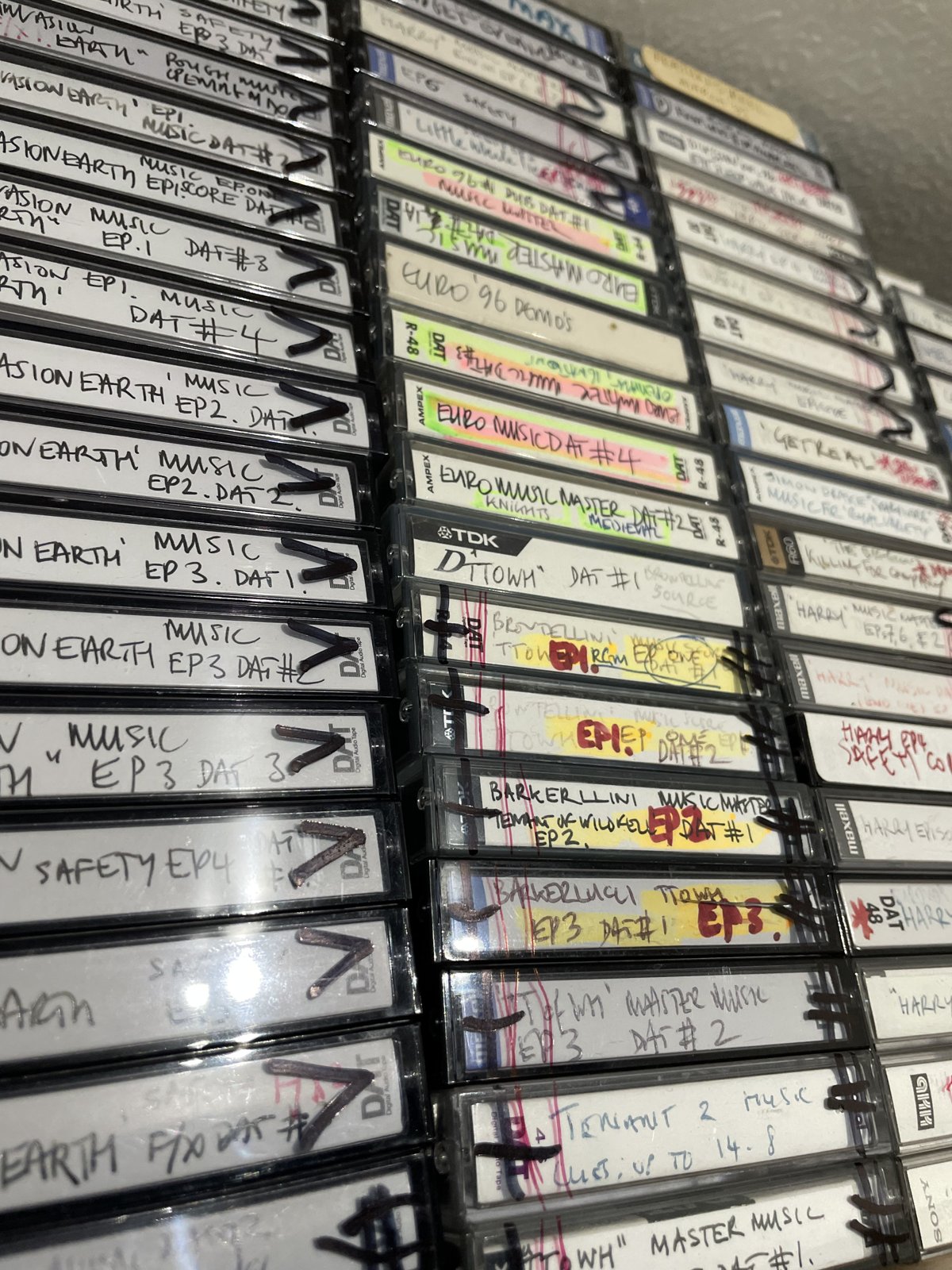 A collection of original DAT recordings with handwritten session labels